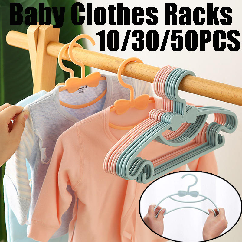 Percheros de Plástico para Rop - Baby Clothing Display reseña y precio